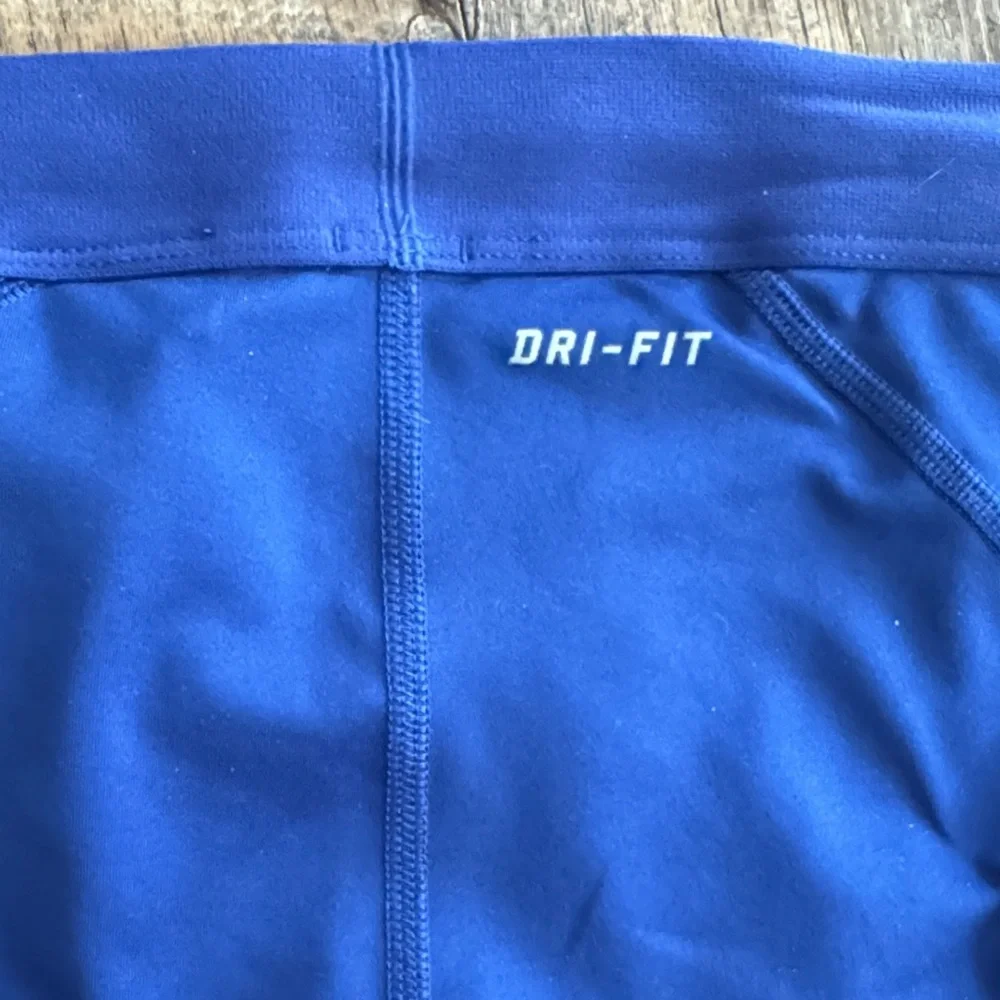 Nike ProbRoyal Blue Capri Leggings with White Swoosh